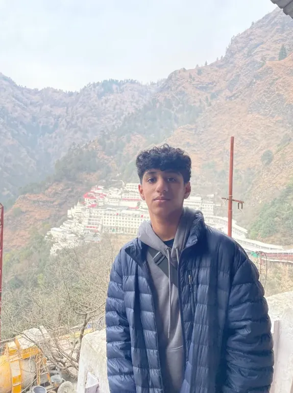 Aarav Bahl with mountains behind him